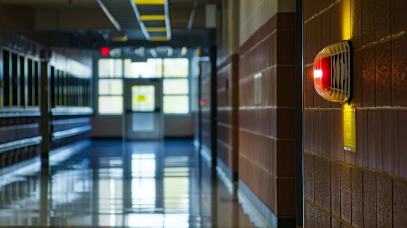 fire alarm in school hallway