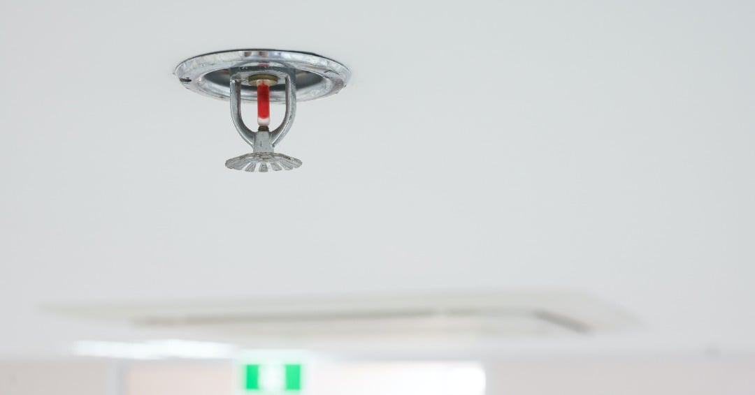 Featured image: fire sprinkler head -  Minnesota Building Code: Sprinkler Requirements Explained