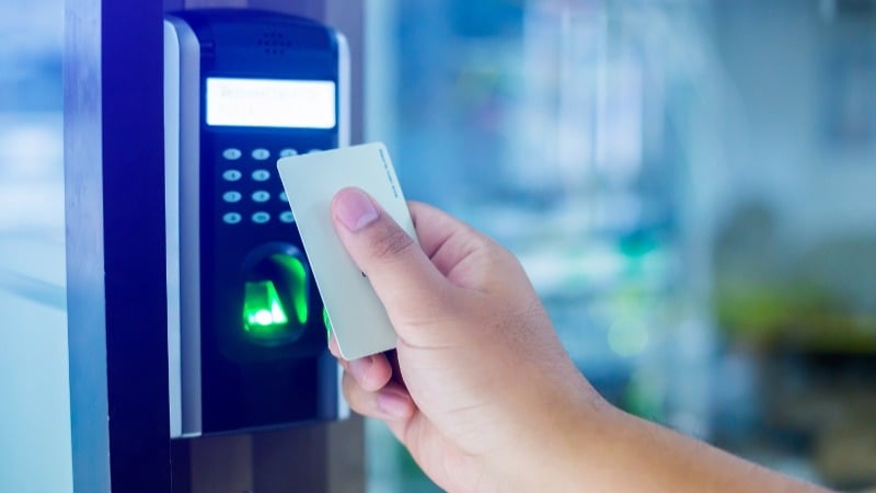 Featured image: access cards and security monitoring are massive parts of controlled access systems - Read full post: Benefits of a Building Access Control System